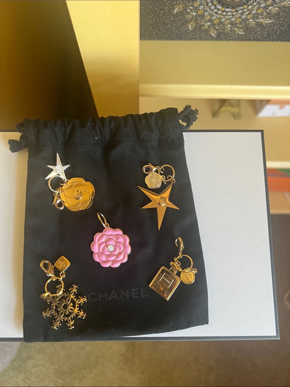 CHANEL Gold-Tone Camellia & Star Charm Set with Pink Camellia Accent